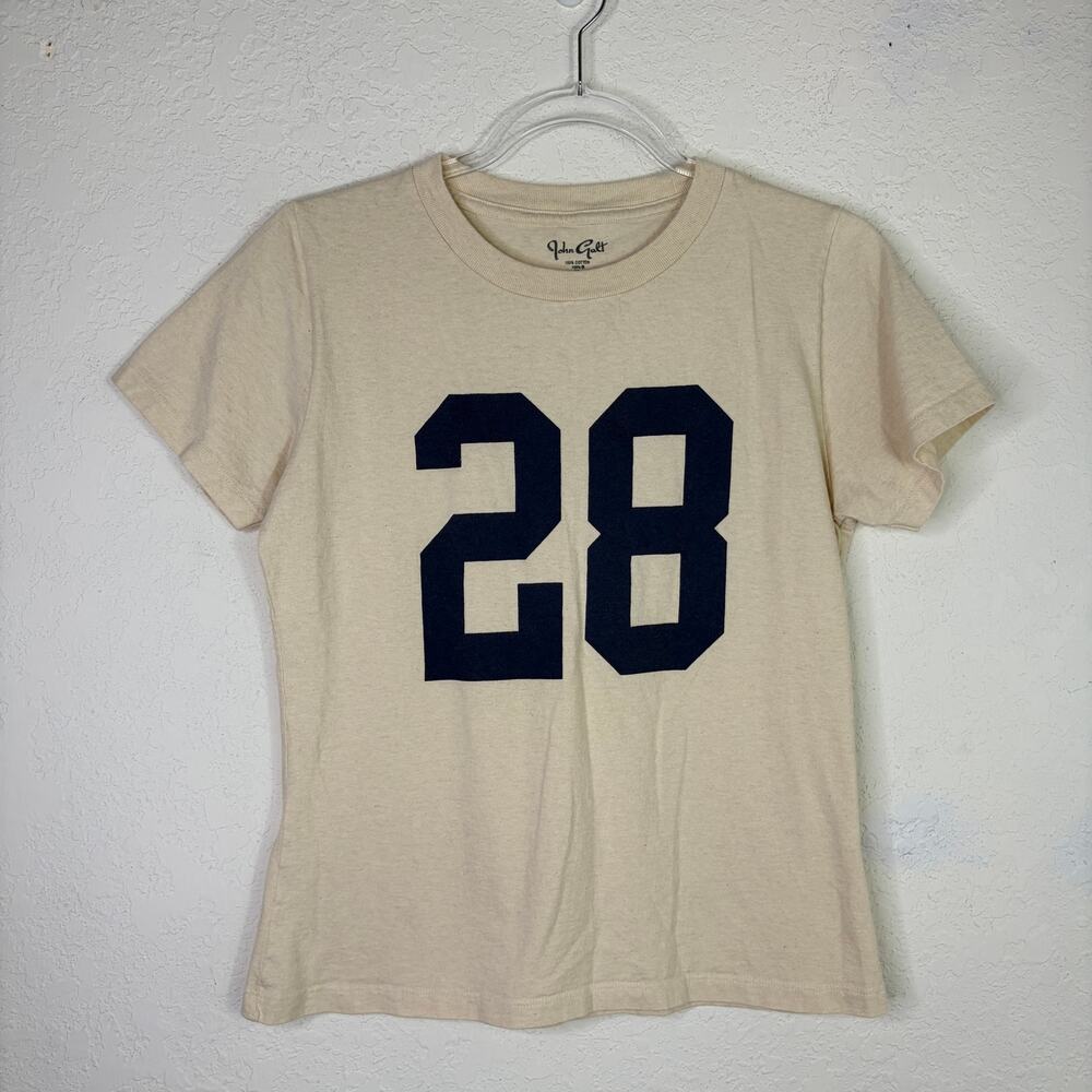 John Galt women's tee, #28, cream color, 100% cotton, size M? sports, school